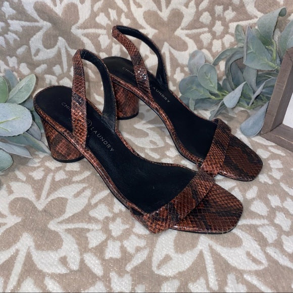 Maroon and black Snake print heels. - Picture 4 of 4